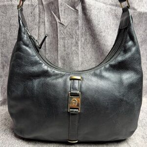 Etienne Aigner Elegant Black Hobo with Gold Details